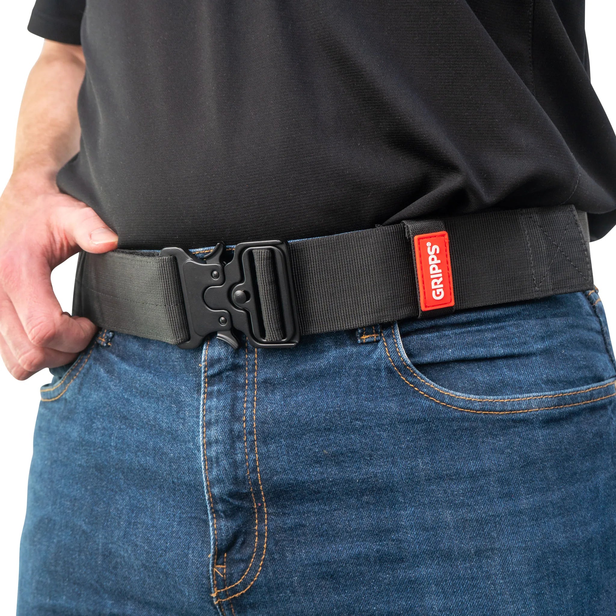 Person wearing GRIPPS Lite Belt standing against a white background